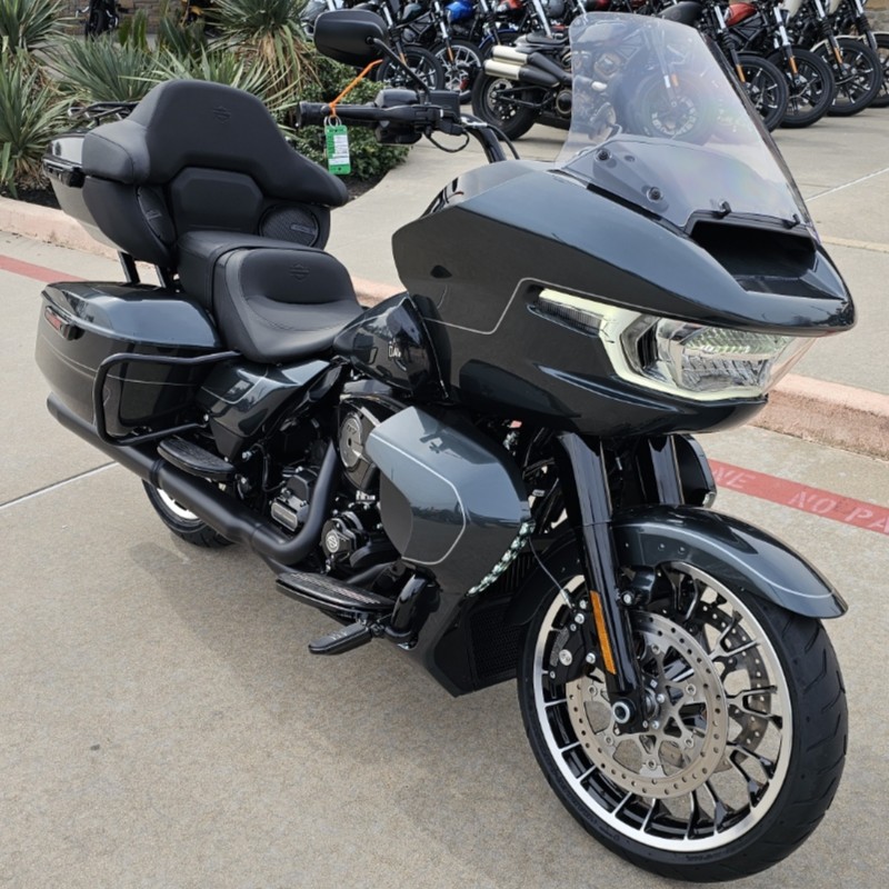 Touring motorcycle parked outside dealership